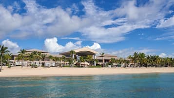 Private beach, white sand, sun loungers, beach umbrellas