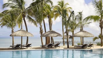 2 outdoor pools, an infinity pool, pool umbrellas
