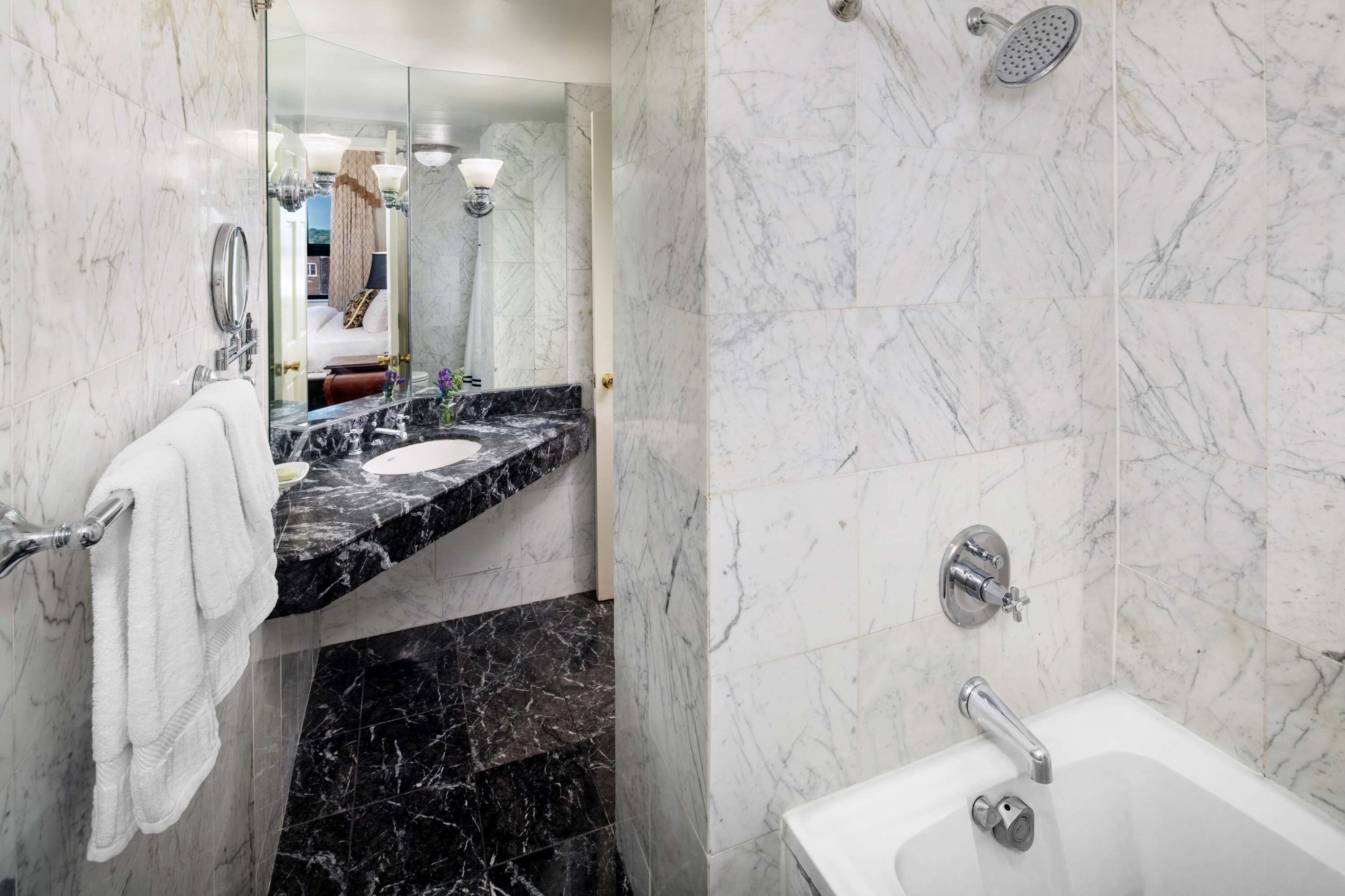 preferred king | bathroom | combined shower/bathtub, designer toiletries, hair dryer, bathrobes