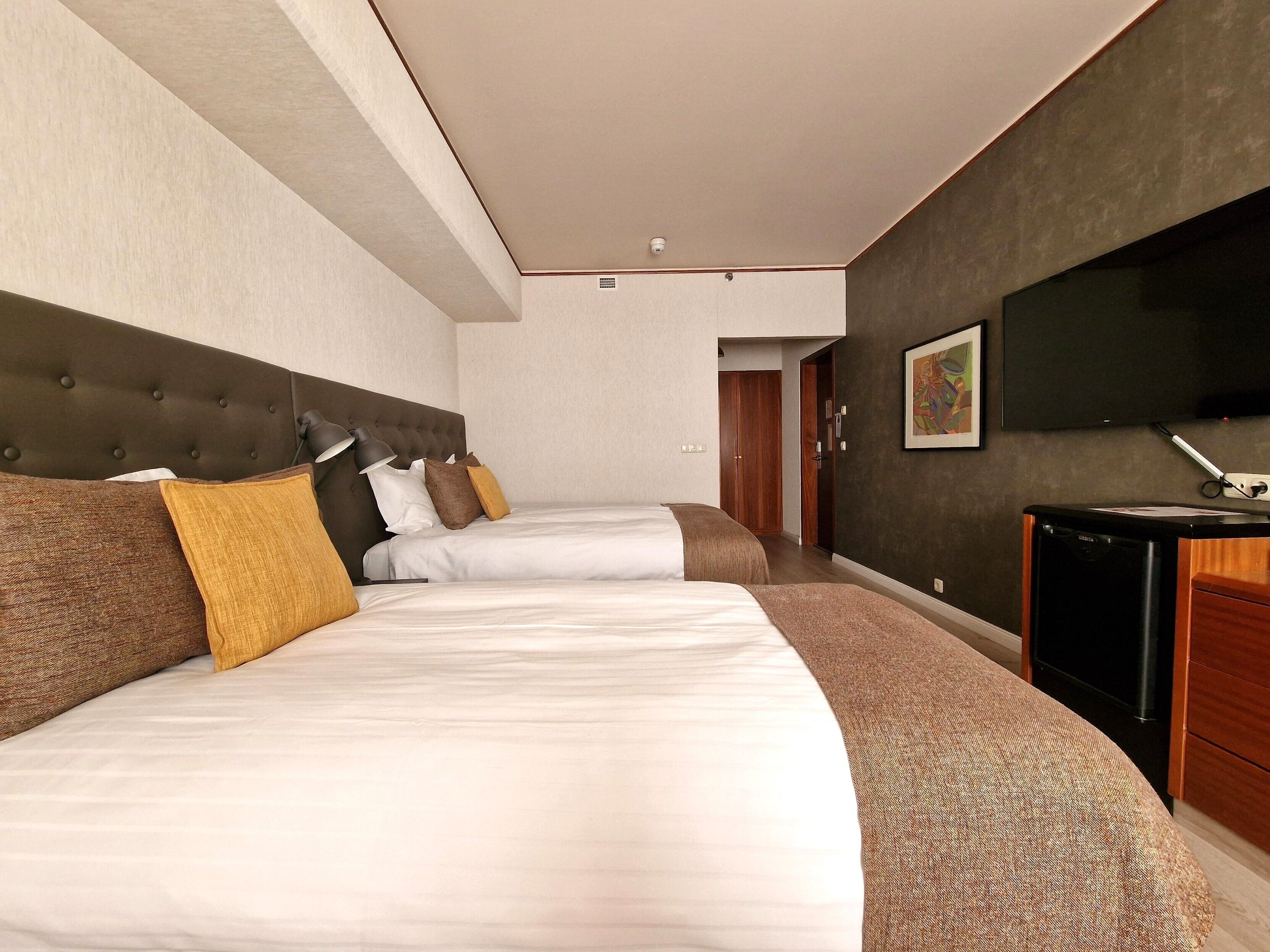 standard triple room | in-room safe, blackout curtains, iron/ironing board, free wifi