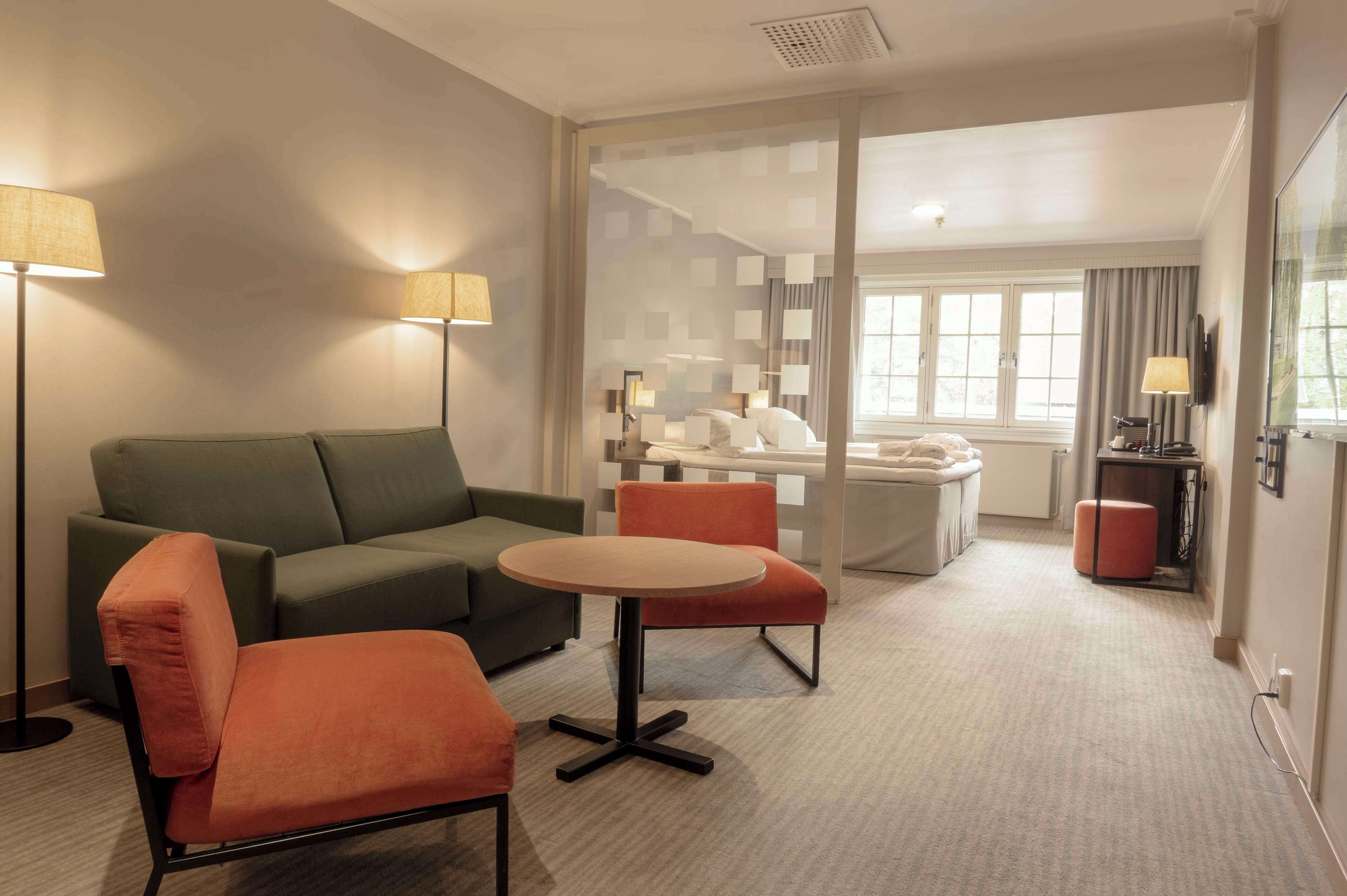 junior suite | pillow-top beds, desk, blackout curtains, iron/ironing board