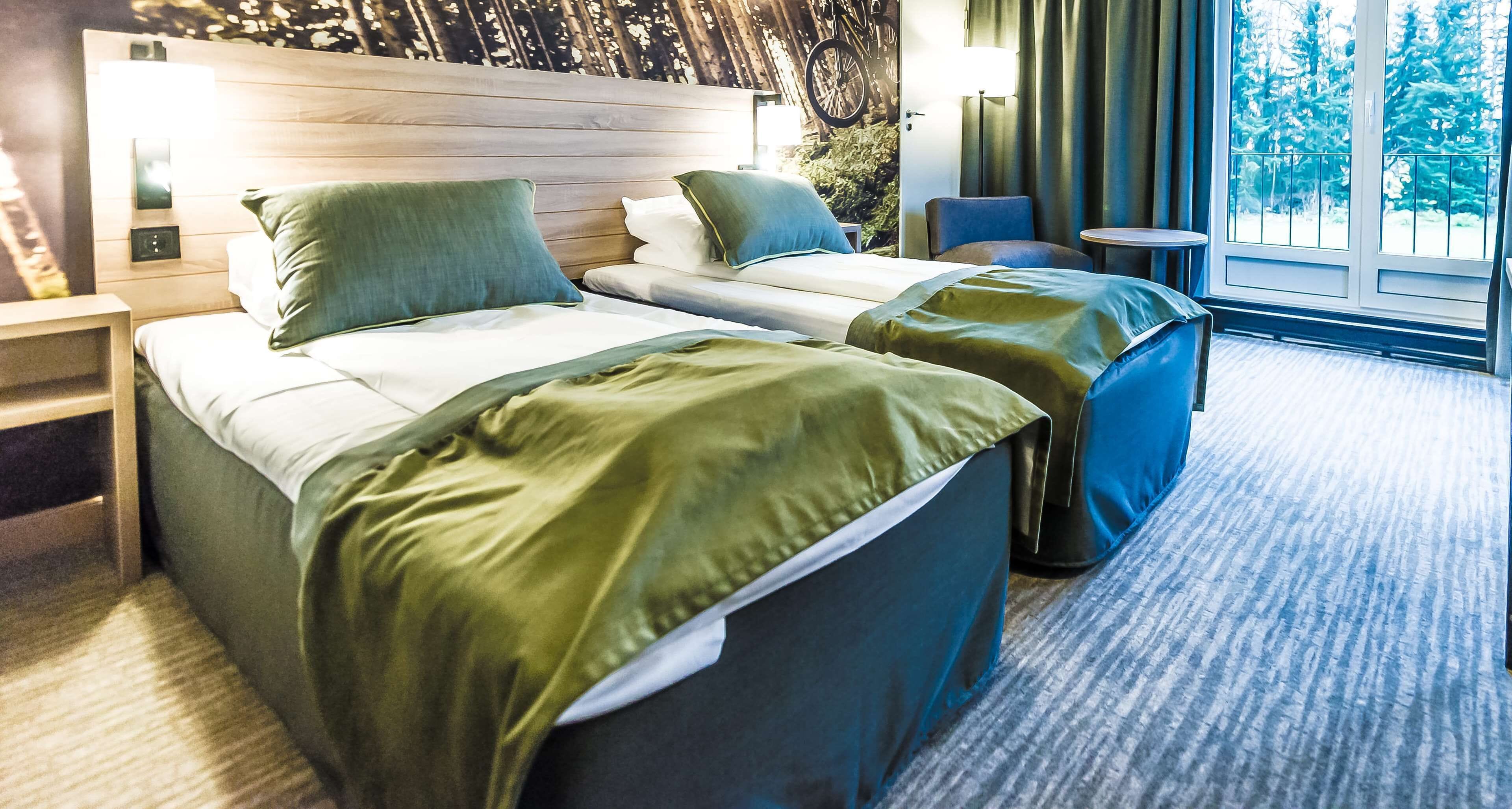 family room (standard) | pillow-top beds, desk, blackout curtains, iron/ironing board