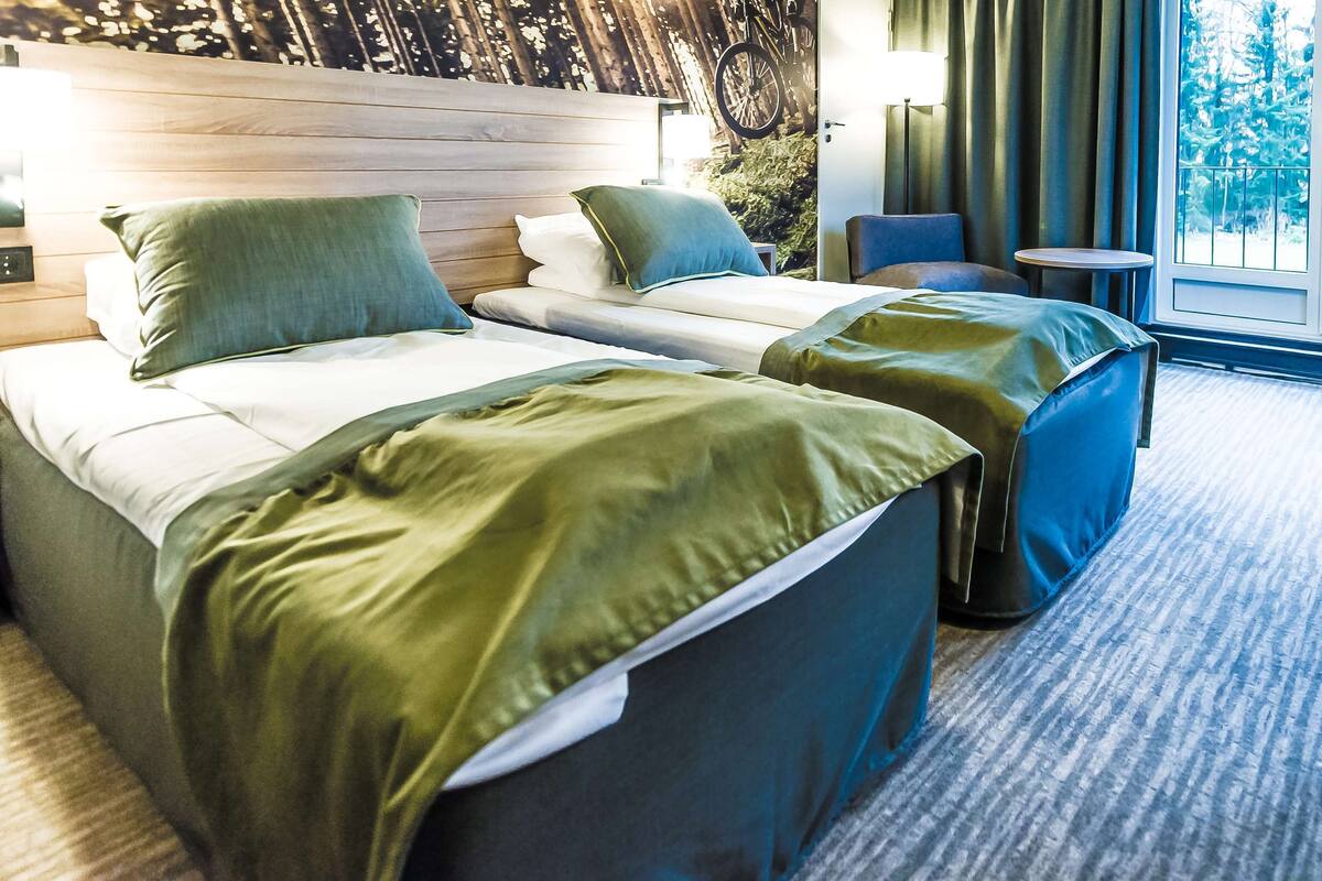 family room (standard) | pillow-top beds, desk, blackout curtains, iron/ironing board