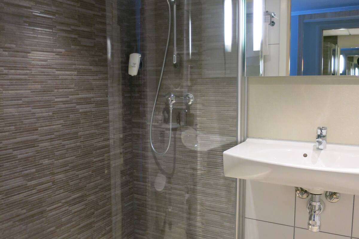 standard room, 1 king bed | pillow-top beds, desk, blackout curtains, iron/ironing board