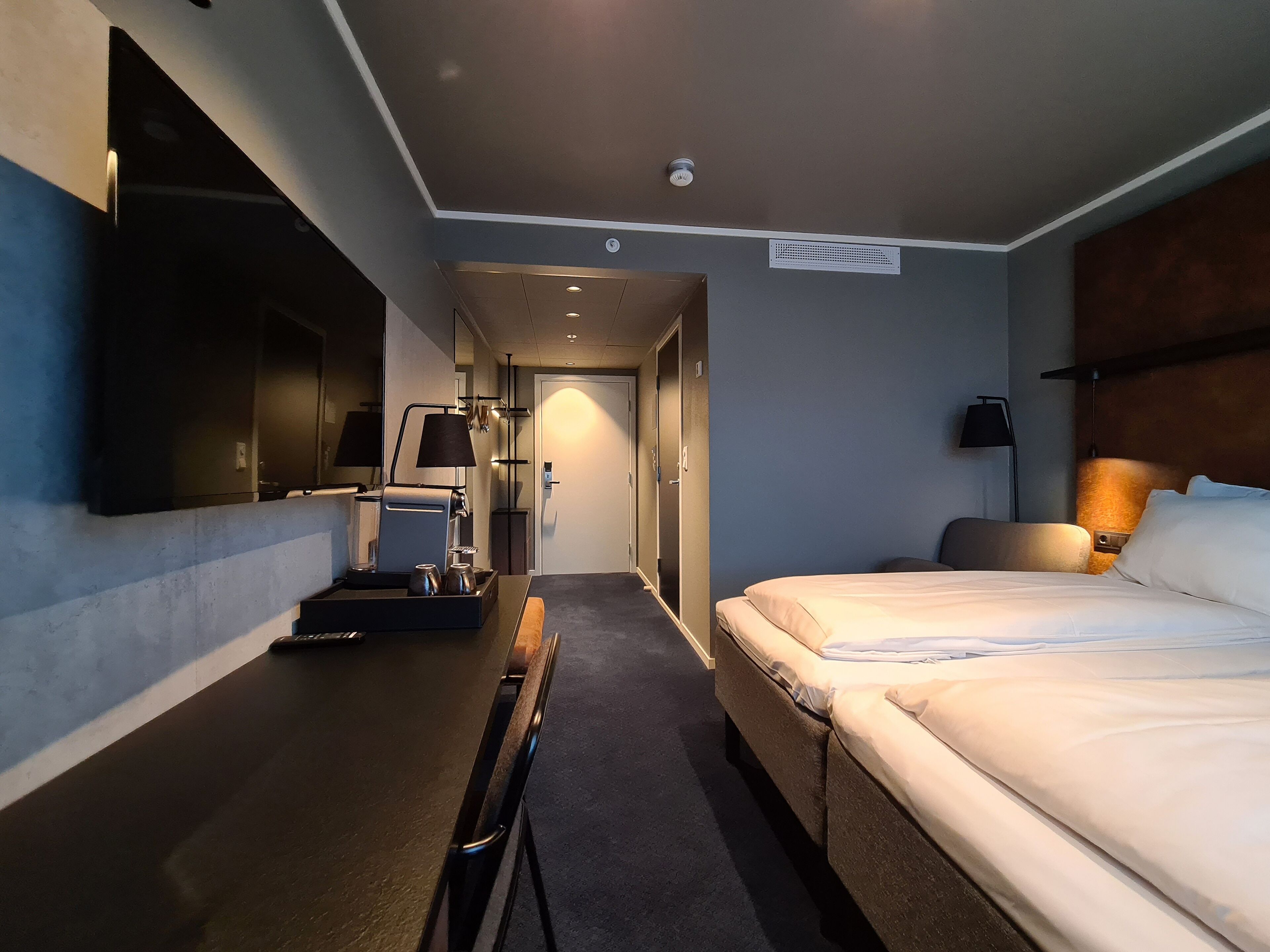 desk, laptop workspace, blackout curtains, free cots/infant beds