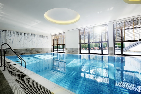 Indoor pool, outdoor pool, open 9:00 AM to 8:00 PM, pool umbrellas