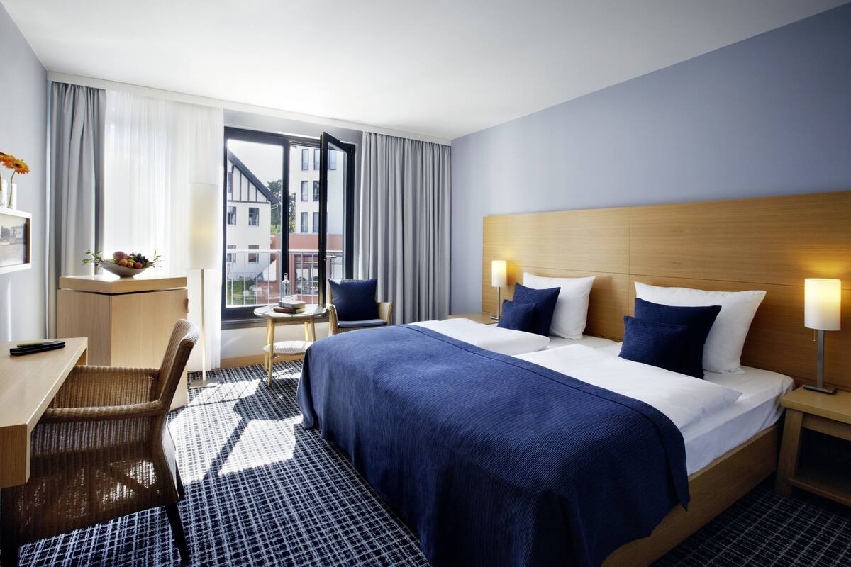 Hypo-allergenic bedding, down duvets, minibar, in-room safe