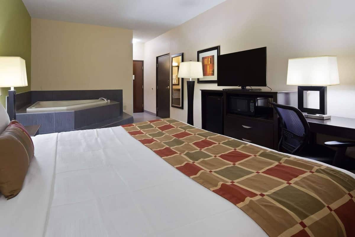 Down comforters, pillowtop beds, in-room safe, desk