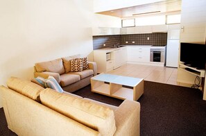 Suite exécutive, 1 chambre, cuisine | Aire de séjour