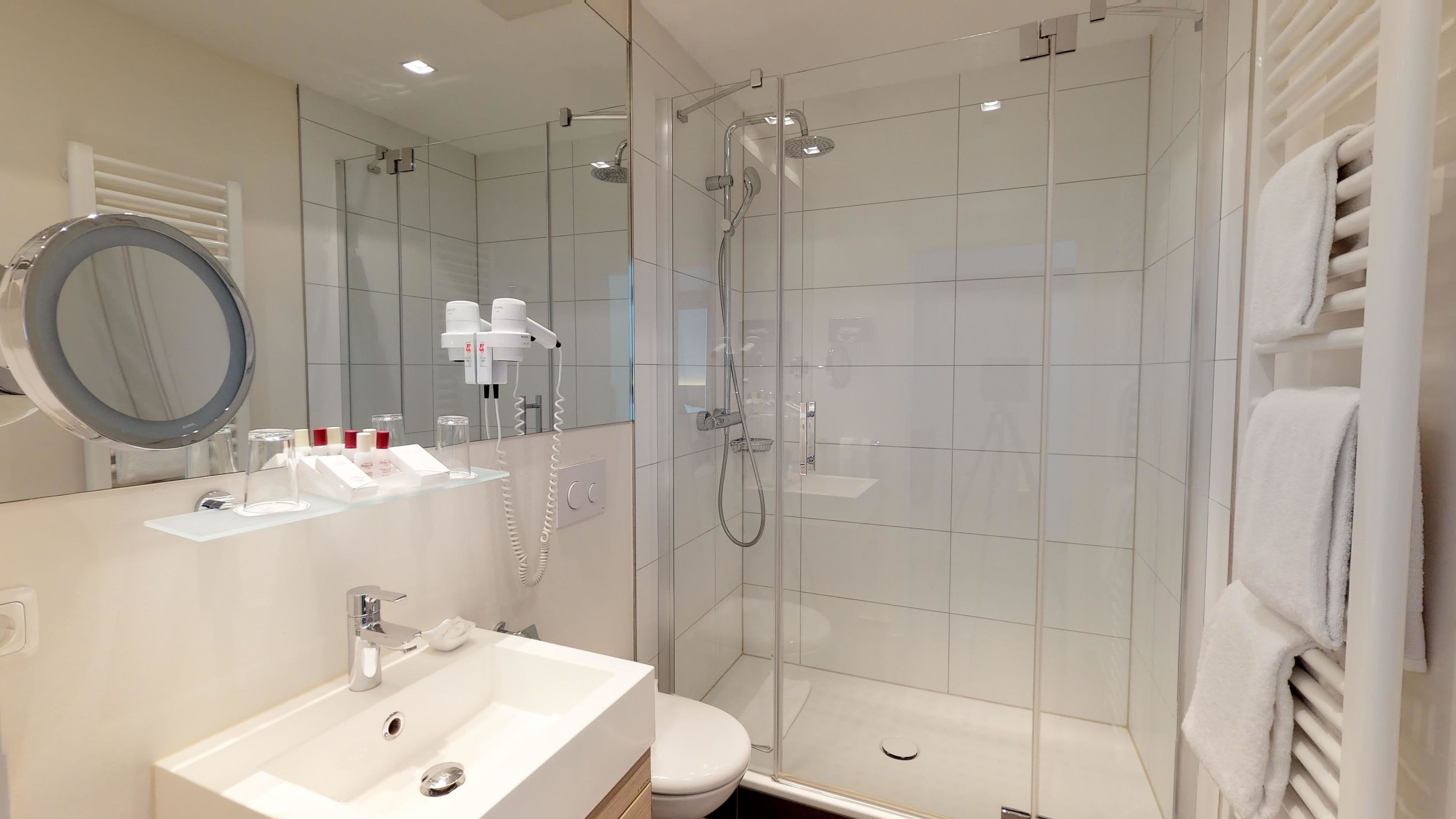 comfort room | bathroom | free toiletries, hair dryer, towels