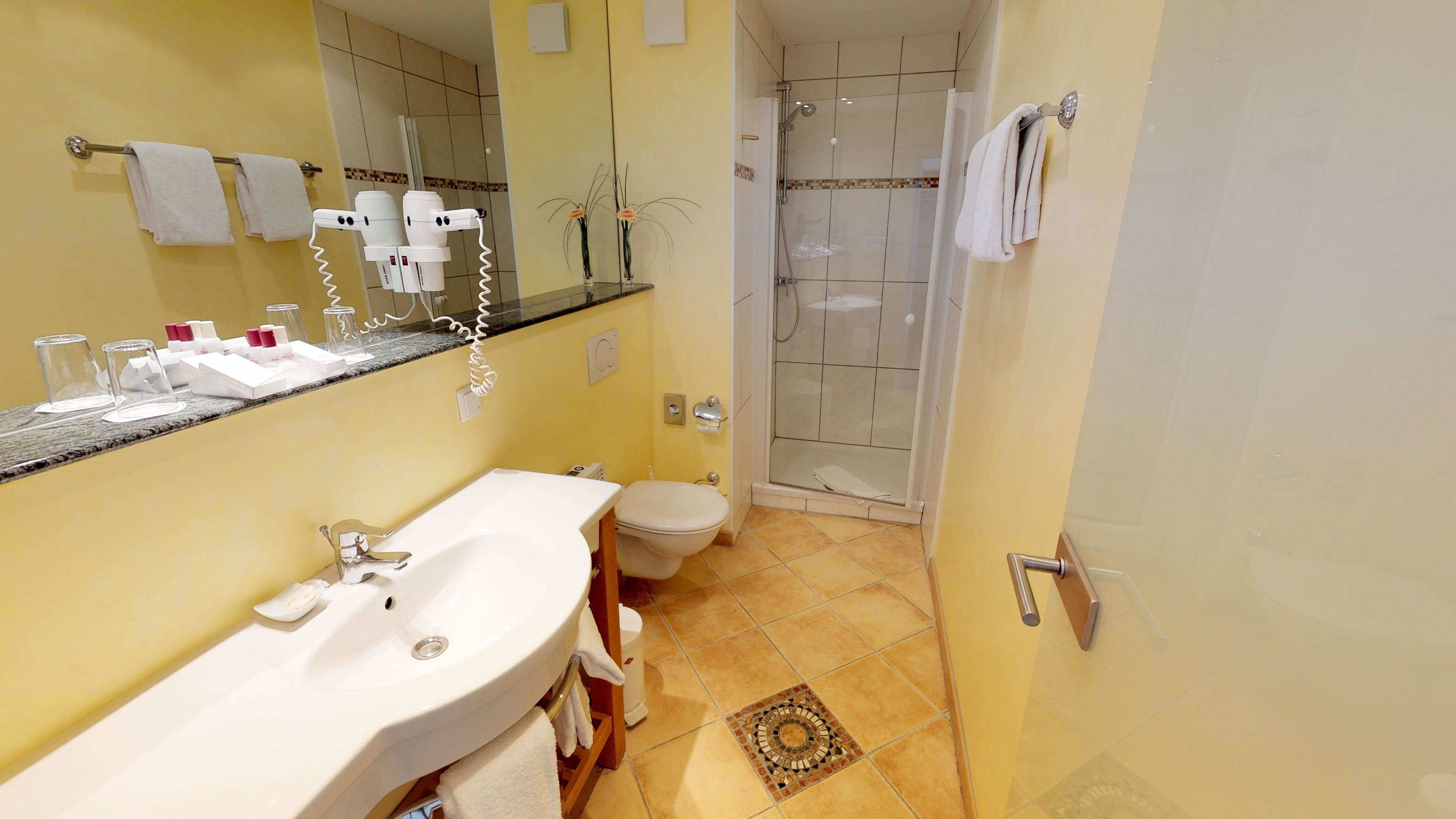 comfort room | bathroom | free toiletries, hair dryer, towels