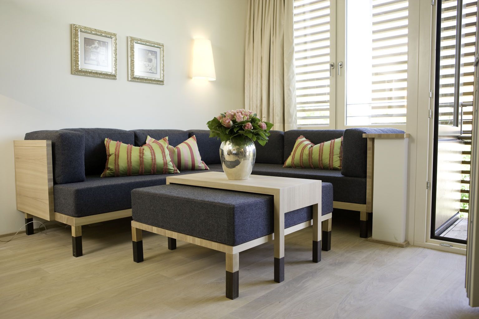 junior suite deluxe with balcony or terrace (auberg) | living area | 40-inch flat-screen tv with cable channels, tv