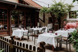Lunch, dinner served; Regional cuisine, al fresco dining  - Romantik Spa Hotel Elixhauser Wirt (Elixhausen)