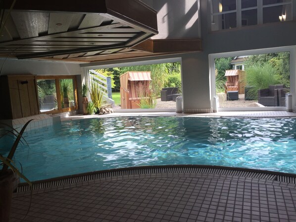 Indoor pool, sun loungers