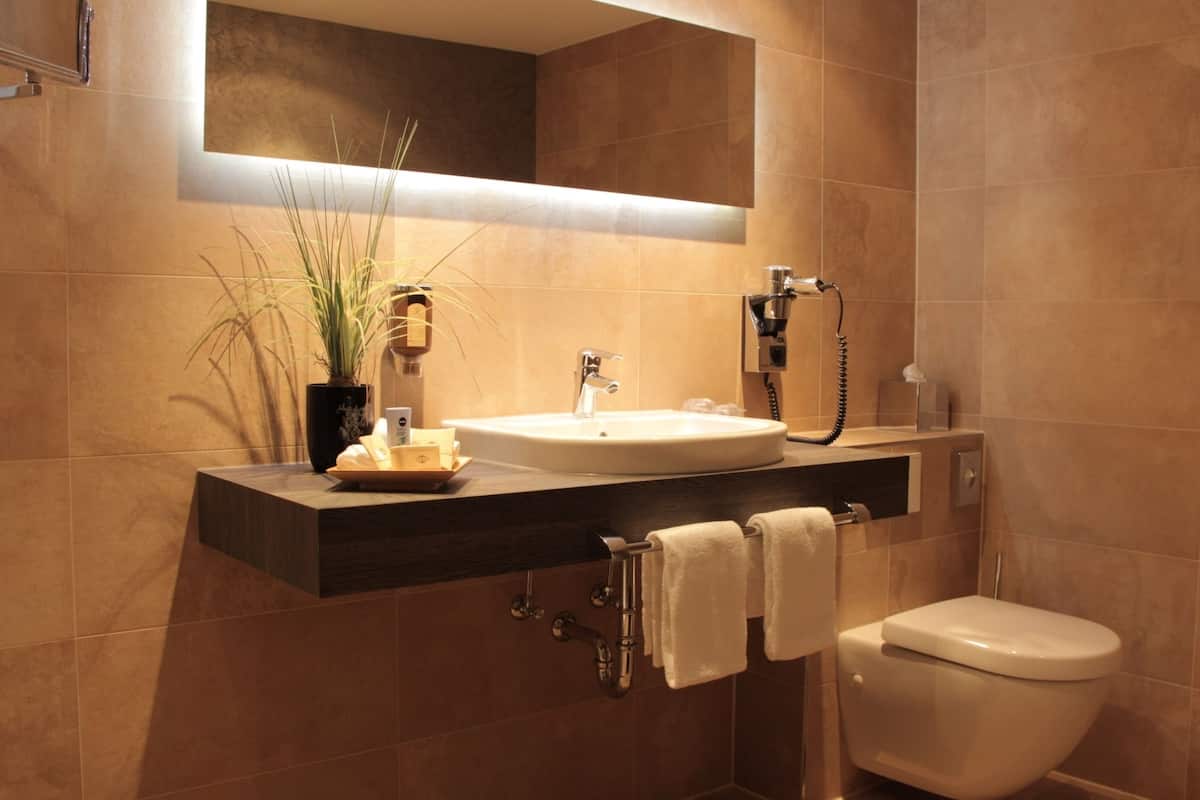 classic double room | bathroom | hair dryer, bathrobes, slippers, towels