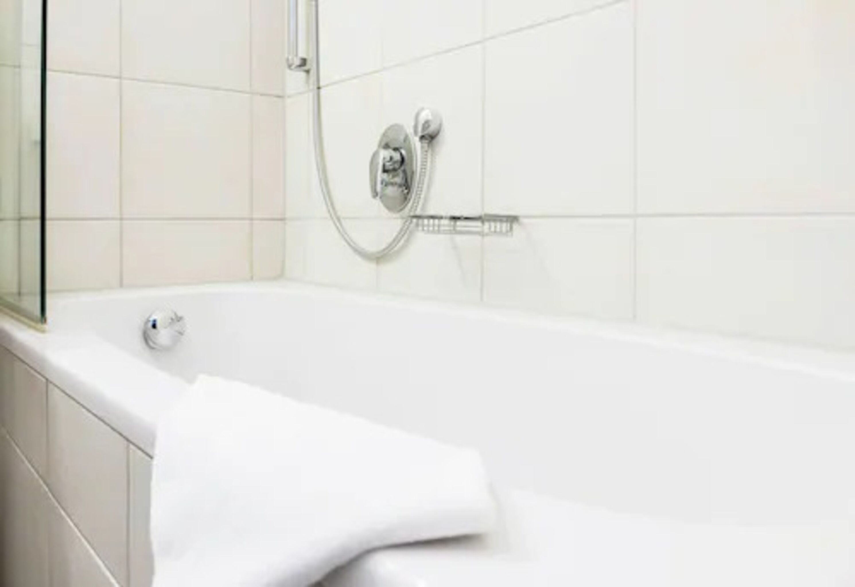 classic double room | bathroom | shower, hair dryer, towels, soap