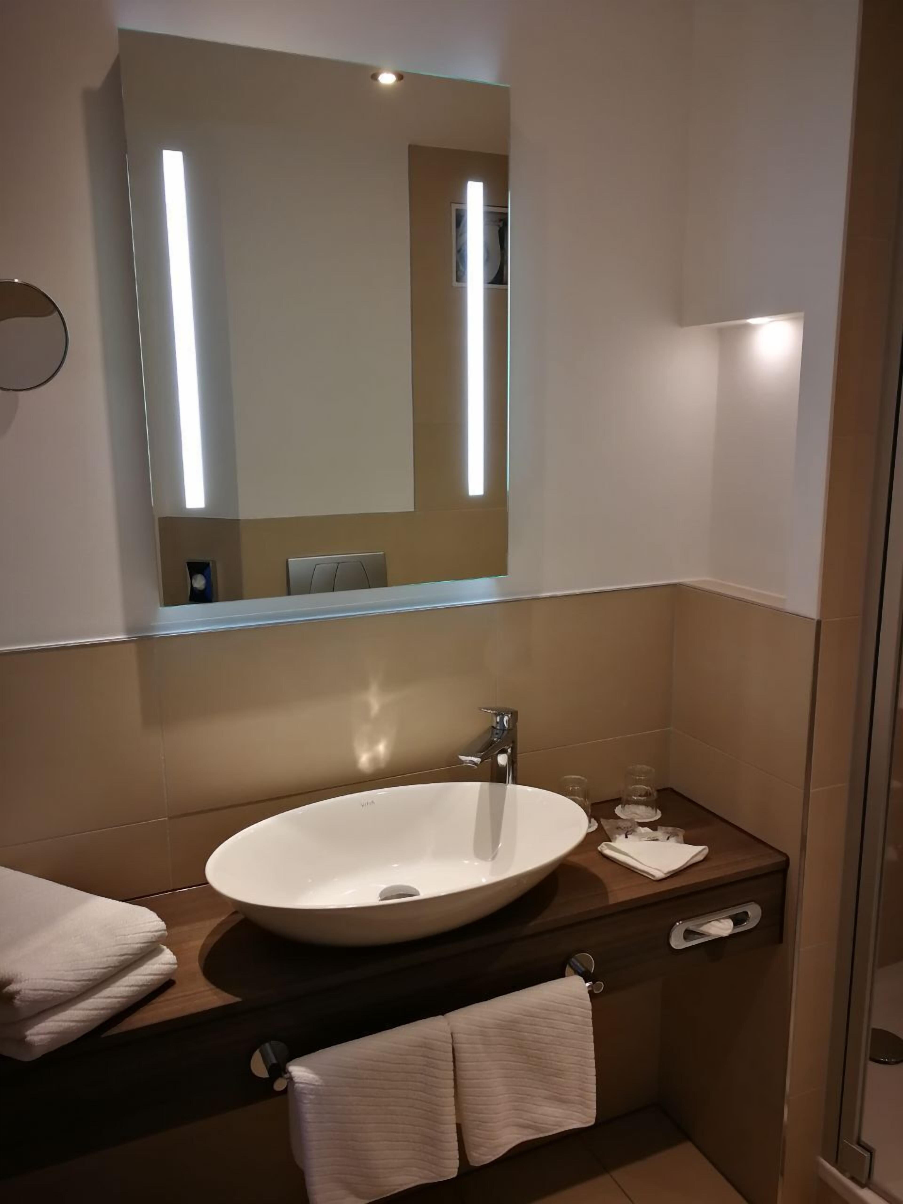 shower, hair dryer, bathrobes, towels