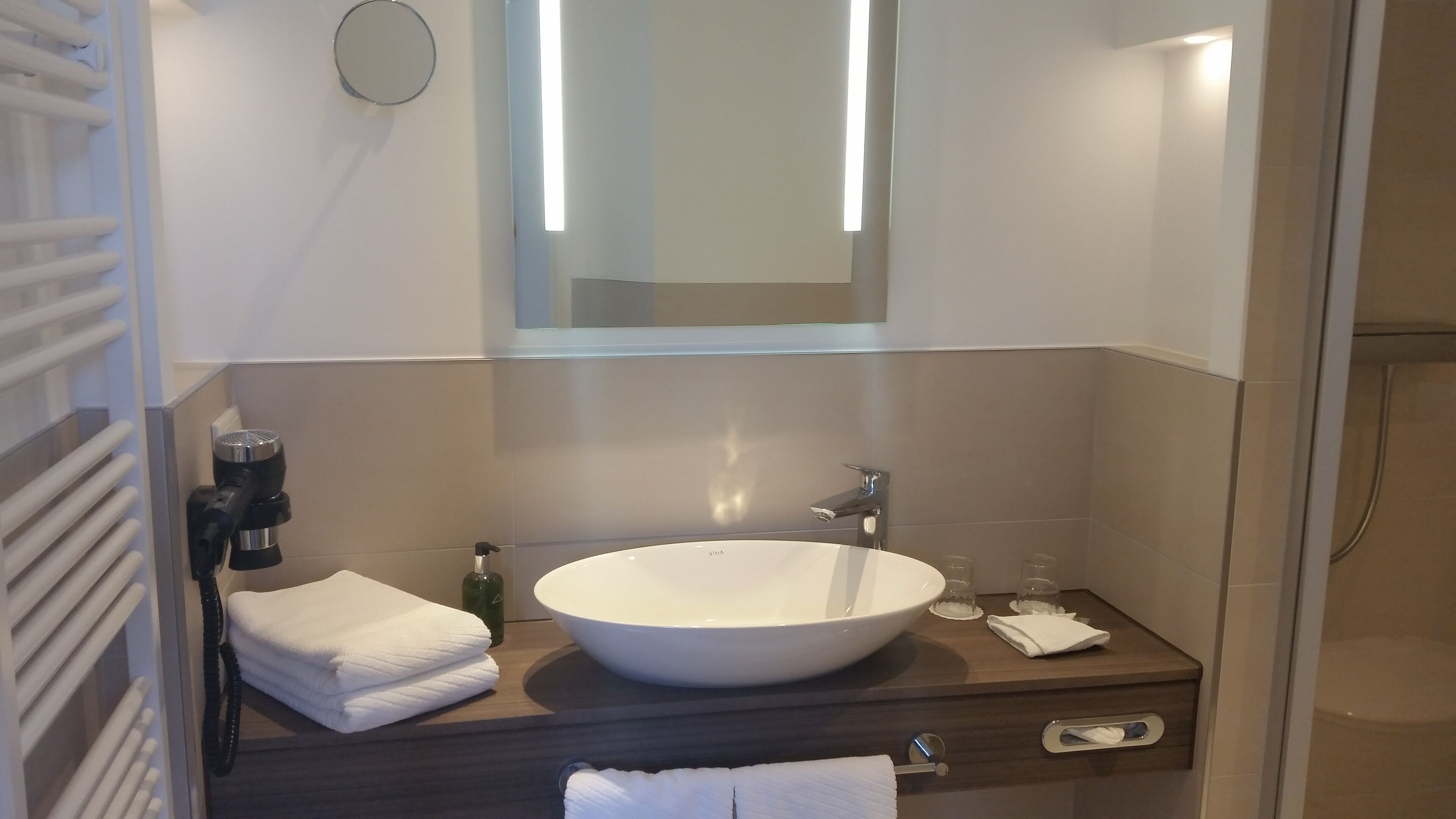 shower, hair dryer, bathrobes, towels