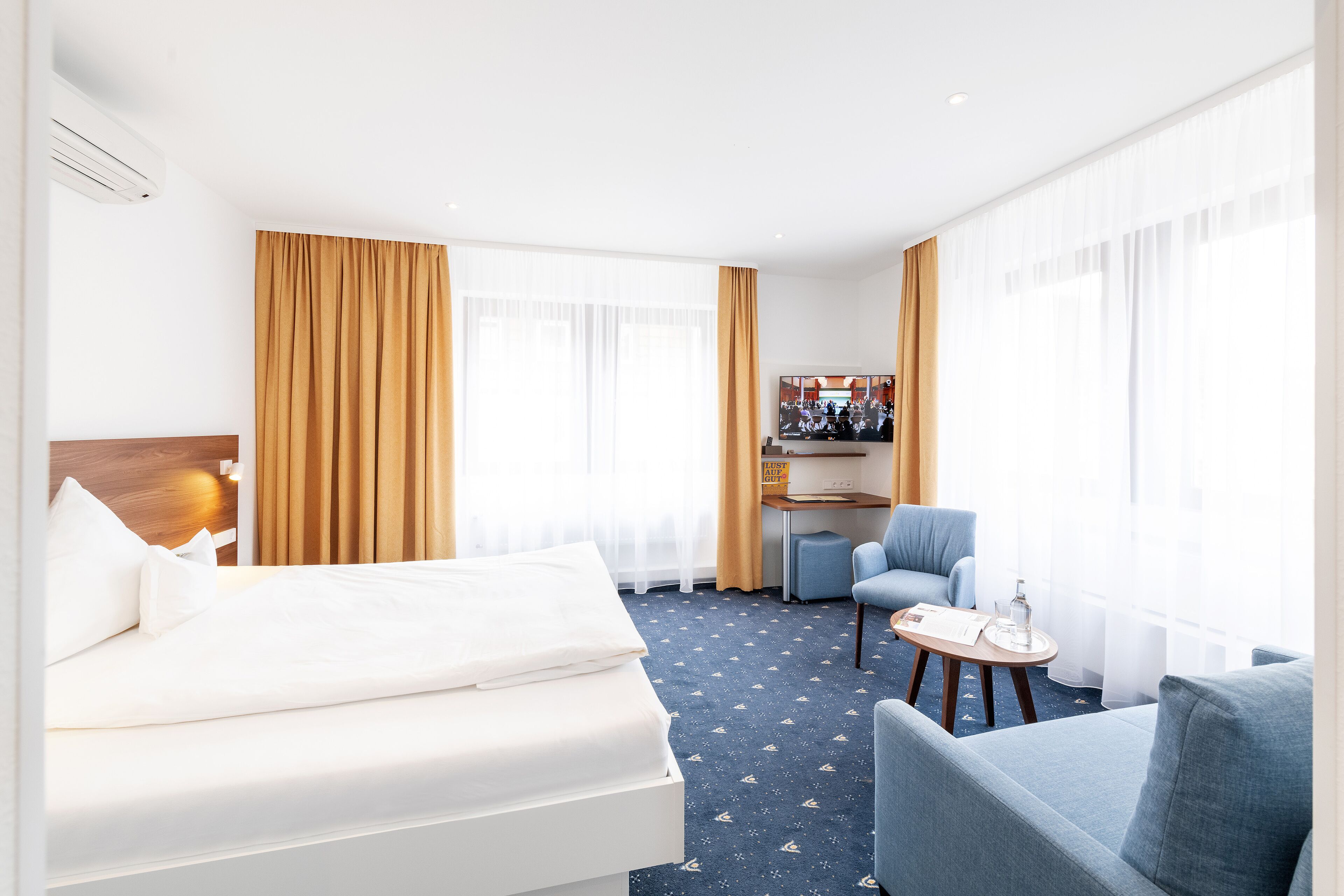 junior suite | 1 bedroom, in-room safe, desk, laptop workspace