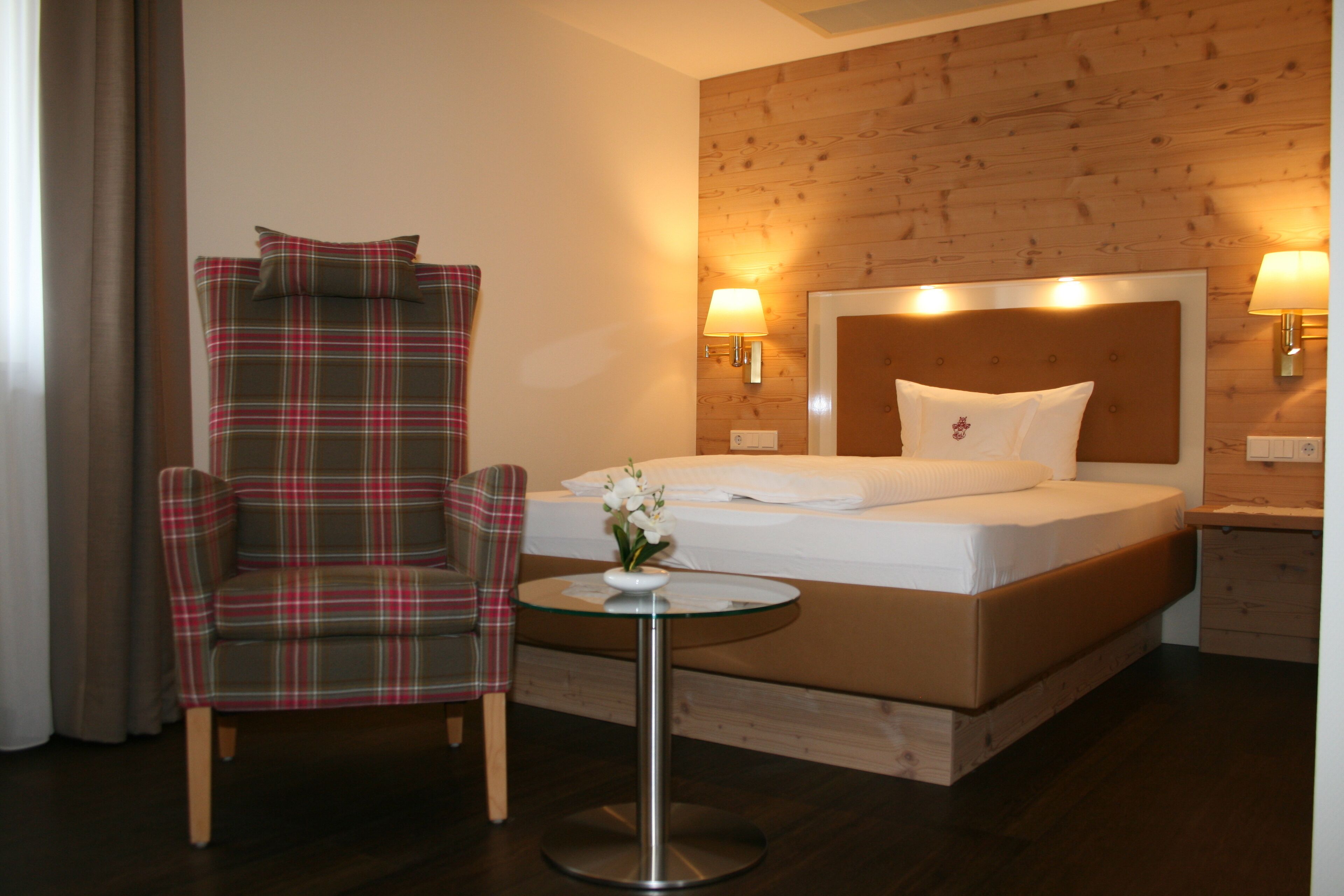 hypo-allergenic bedding, desk, laptop workspace, blackout curtains