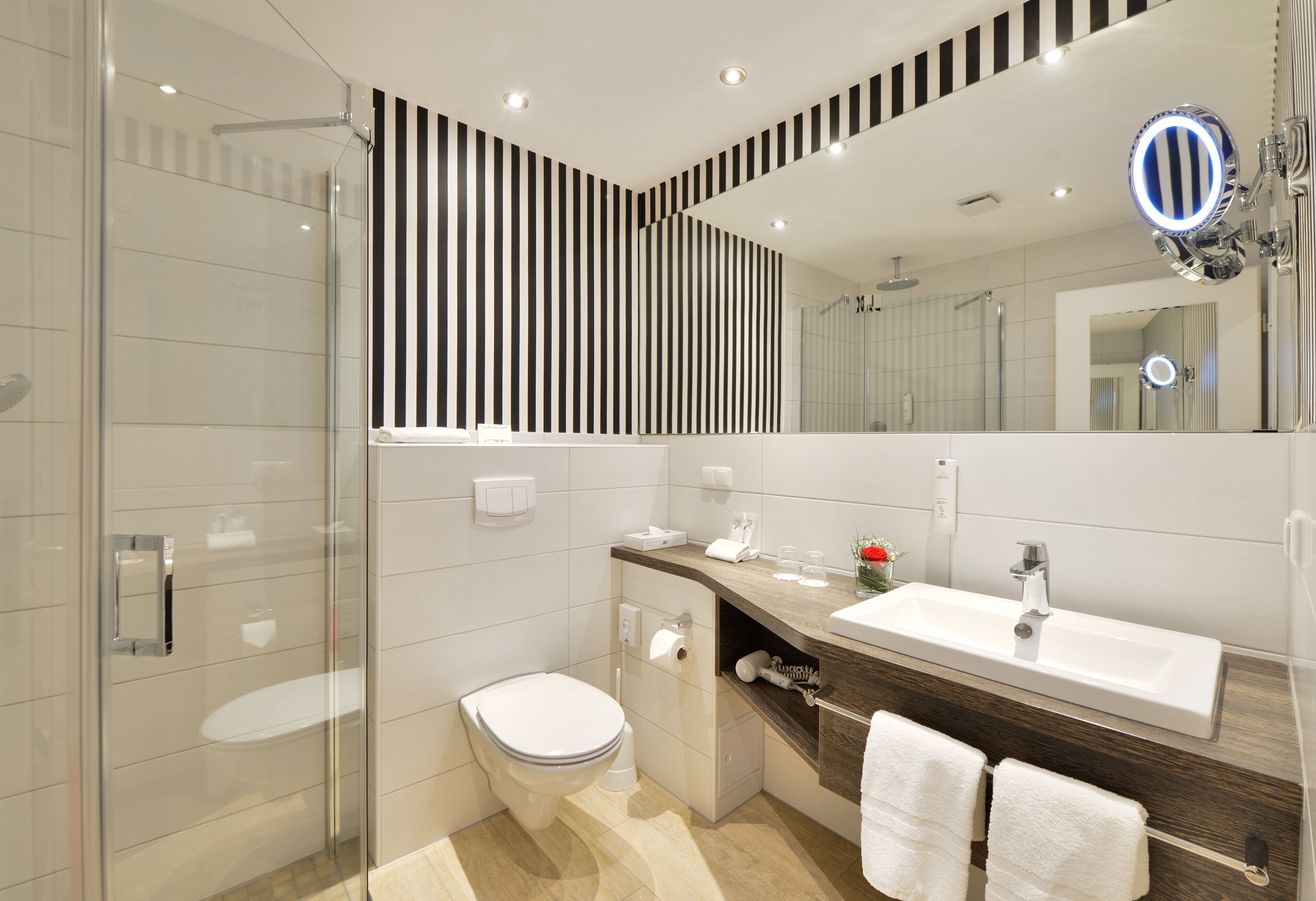 shower, hair dryer, bathrobes, slippers