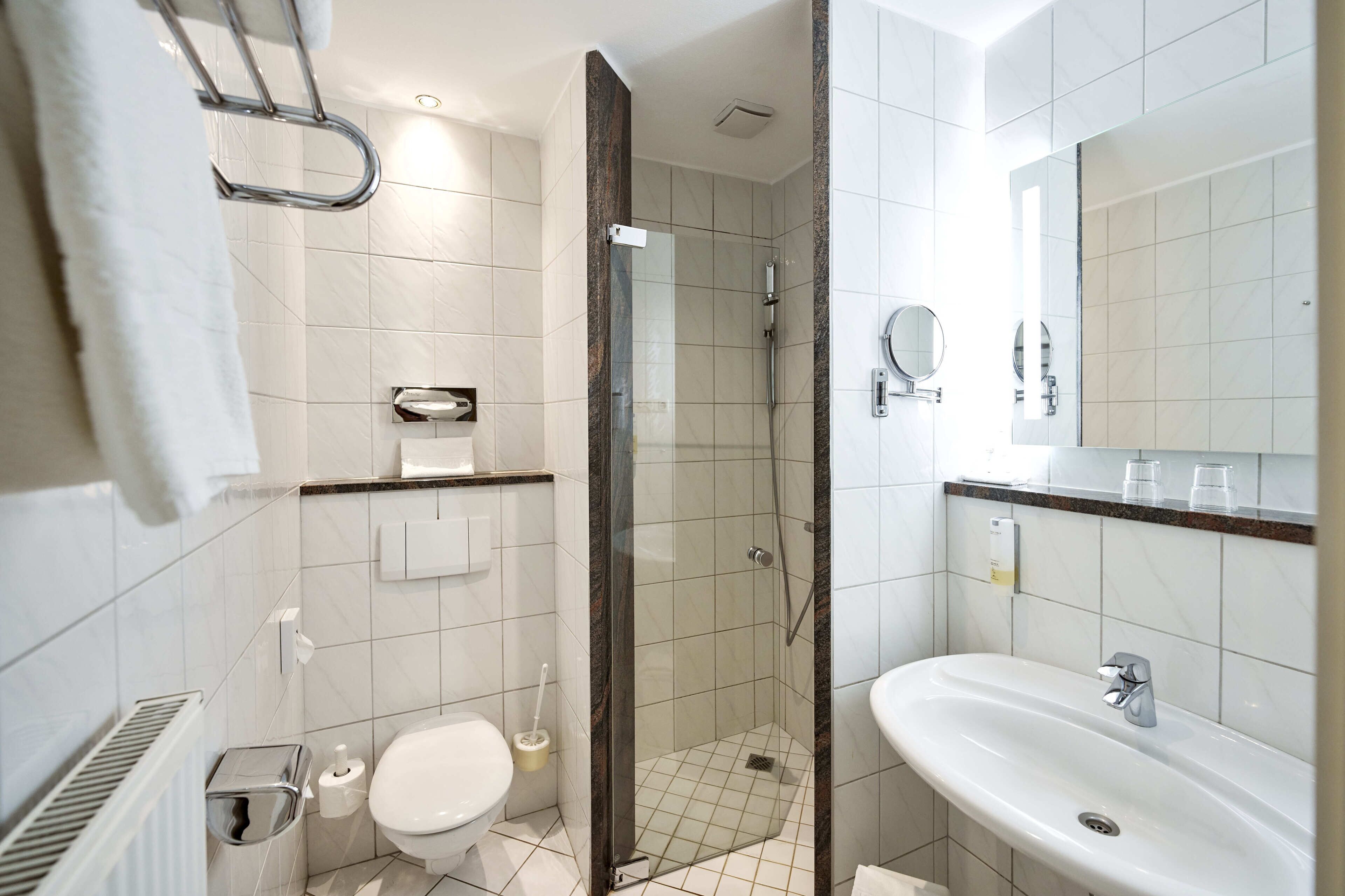 shower, hair dryer, bathrobes, slippers