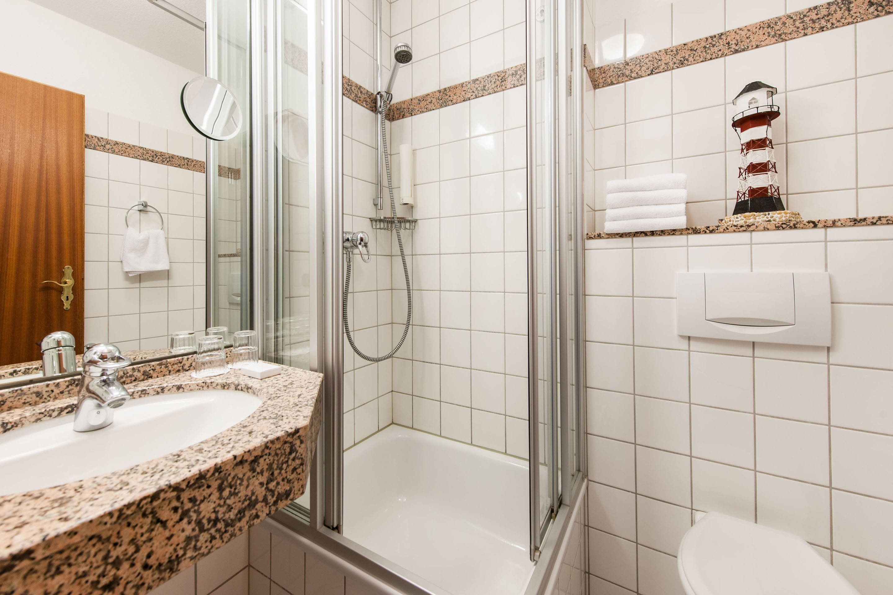 shower, free toiletries, hair dryer, towels