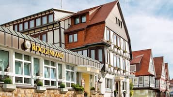 Experience the charm of ROGGENLAND, a traditional European-style building with a warm and inviting atmosphere.