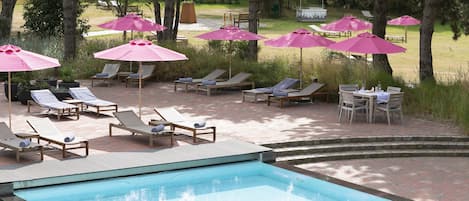 Indoor pool, seasonal outdoor pool, pool umbrellas, sun loungers