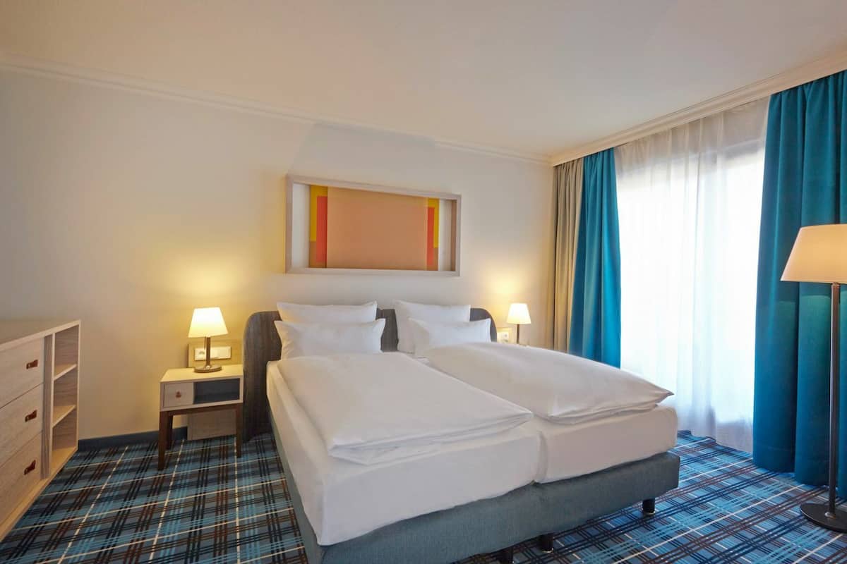 Junior Suite | 1 bedroom, premium bedding, minibar, in-room safe