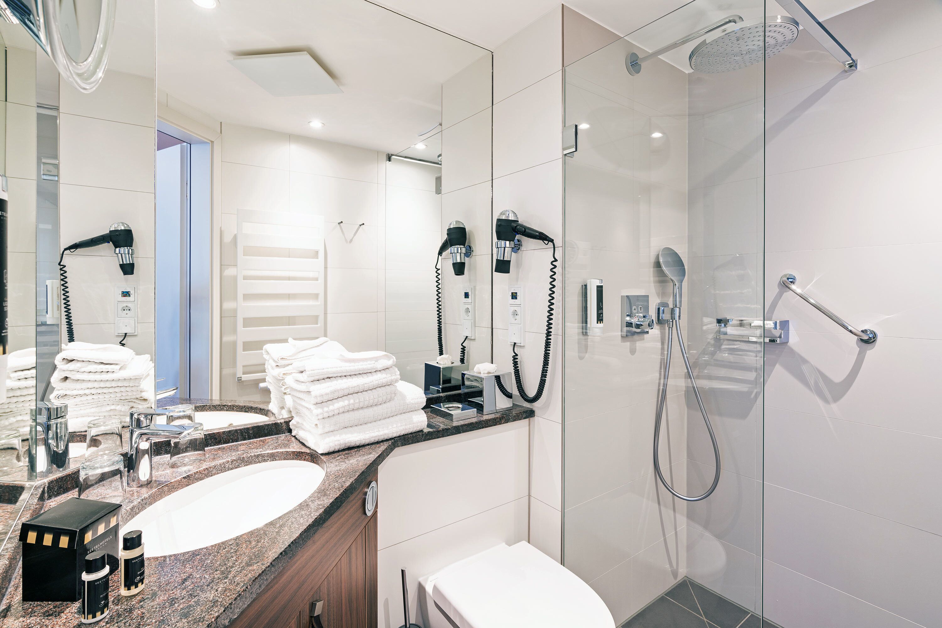 free toiletries, hair dryer, towels, soap