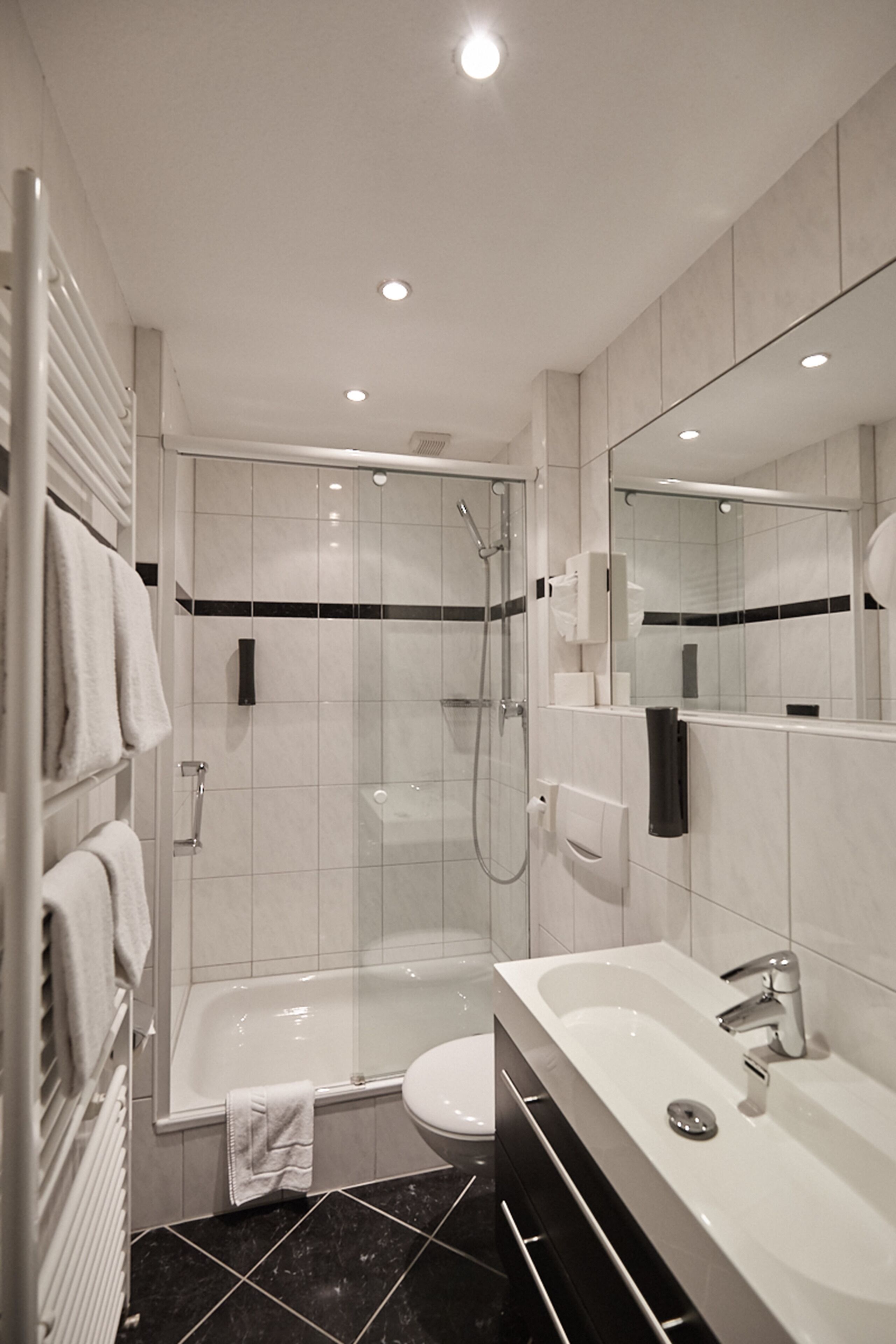 shower, free toiletries, hair dryer, towels