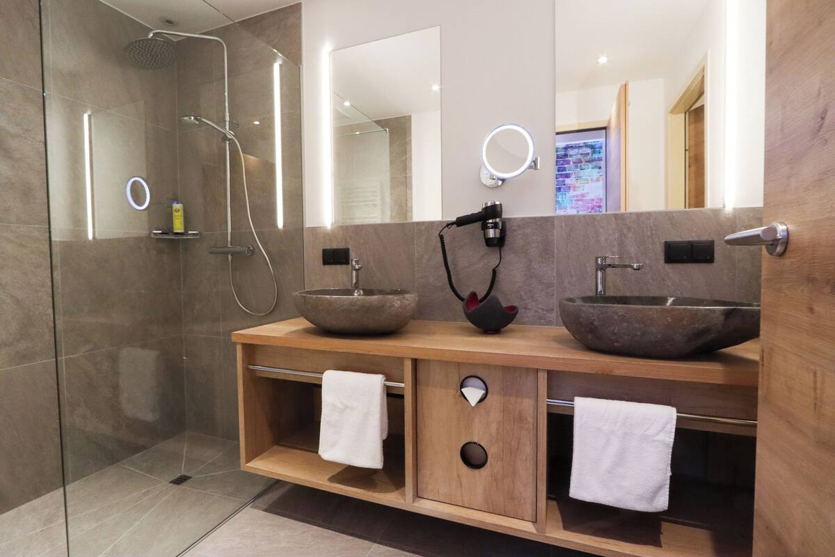 happy surprise room | bathroom | shower, hair dryer, bathrobes, towels