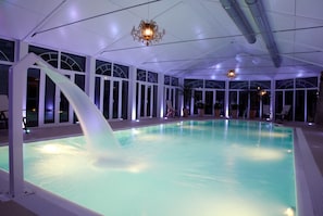 Indoor pool, open 8:00 AM to 8:00 PM, pool loungers