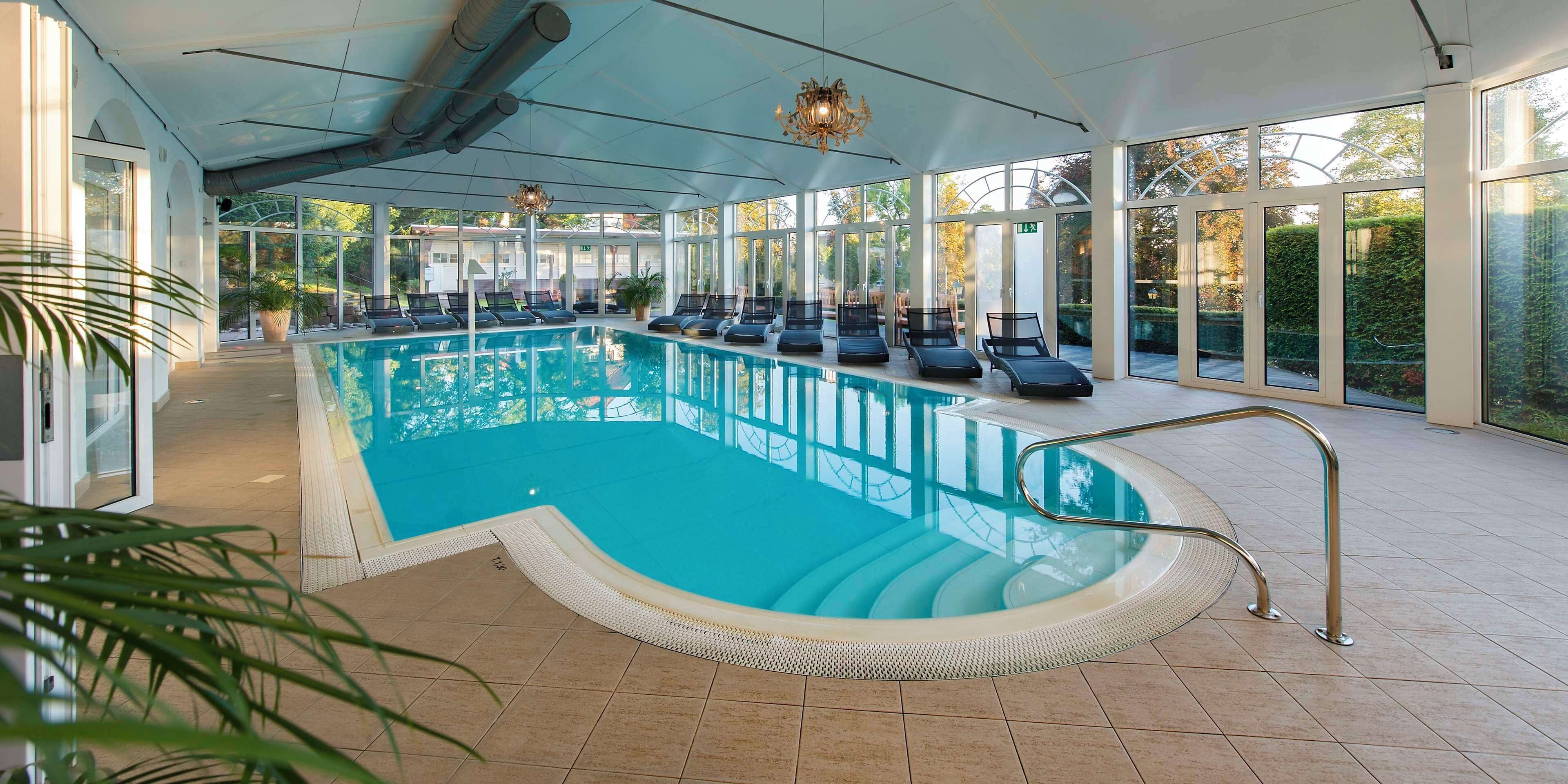 indoor pool, open 8:00 am to 8:00 pm, pool loungers