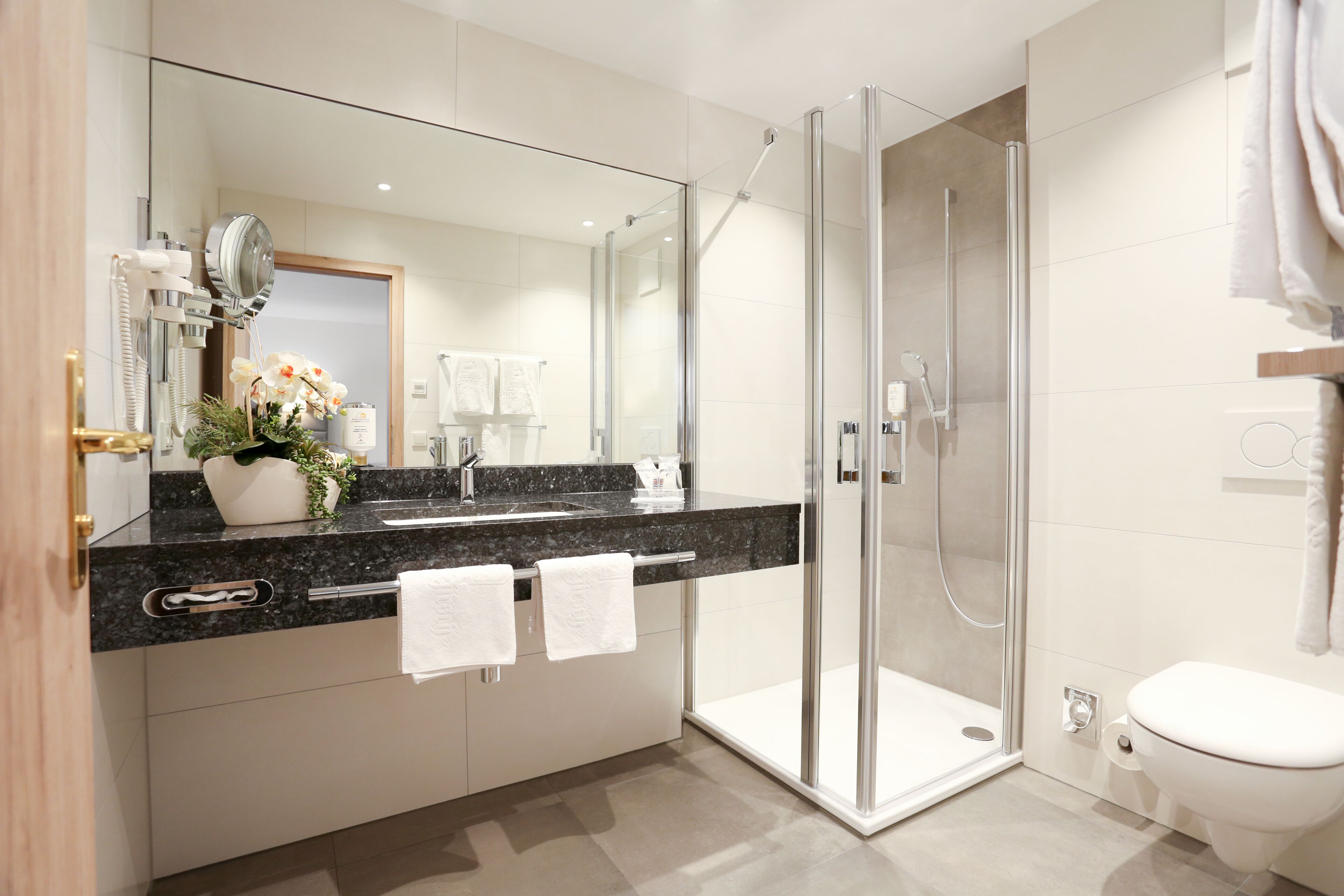 free toiletries, hair dryer, bathrobes, slippers