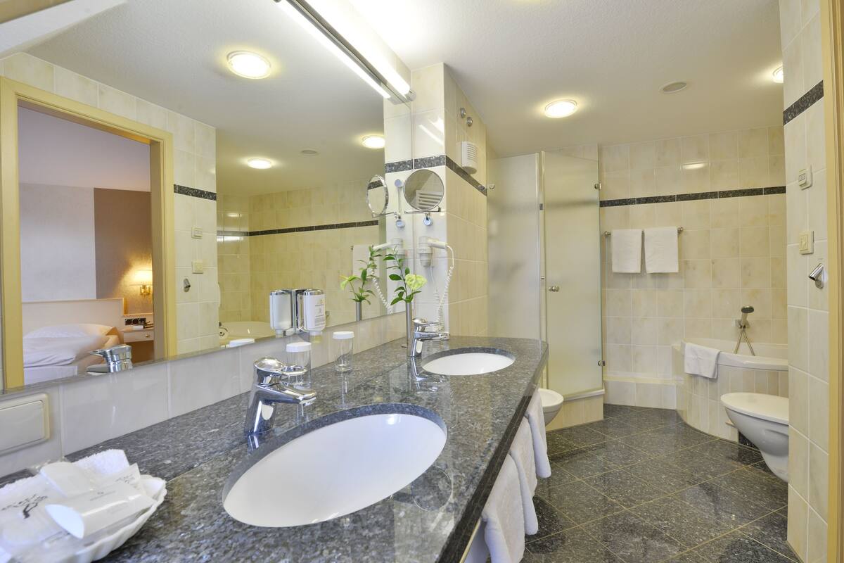 suite | bathroom | free toiletries, hair dryer, bathrobes, slippers