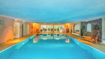 Indoor pool, open 7:00 AM to 10:00 PM, sun loungers