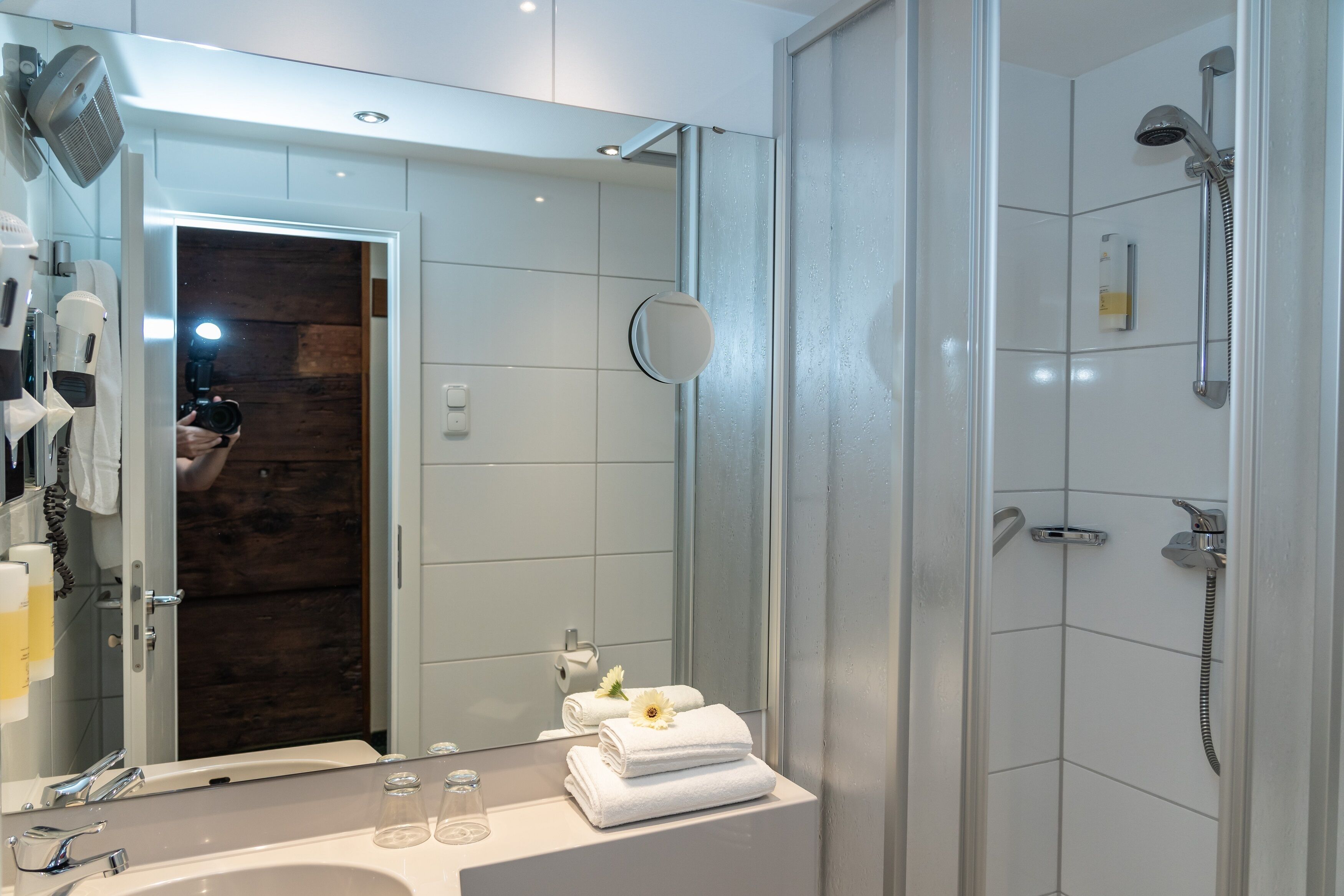 superior double room | bathroom | shower, free toiletries, hair dryer, towels