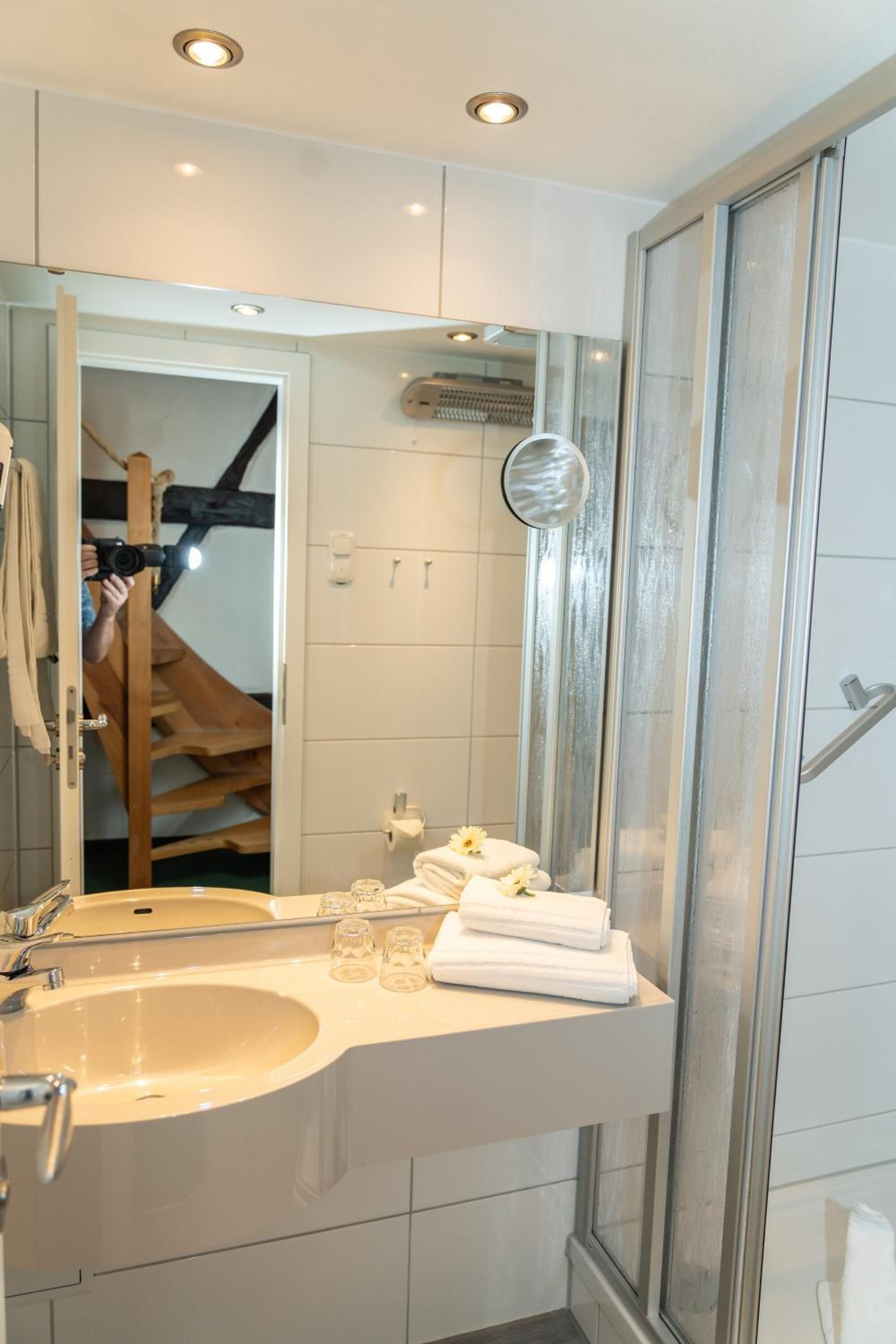 shower, free toiletries, hair dryer, towels