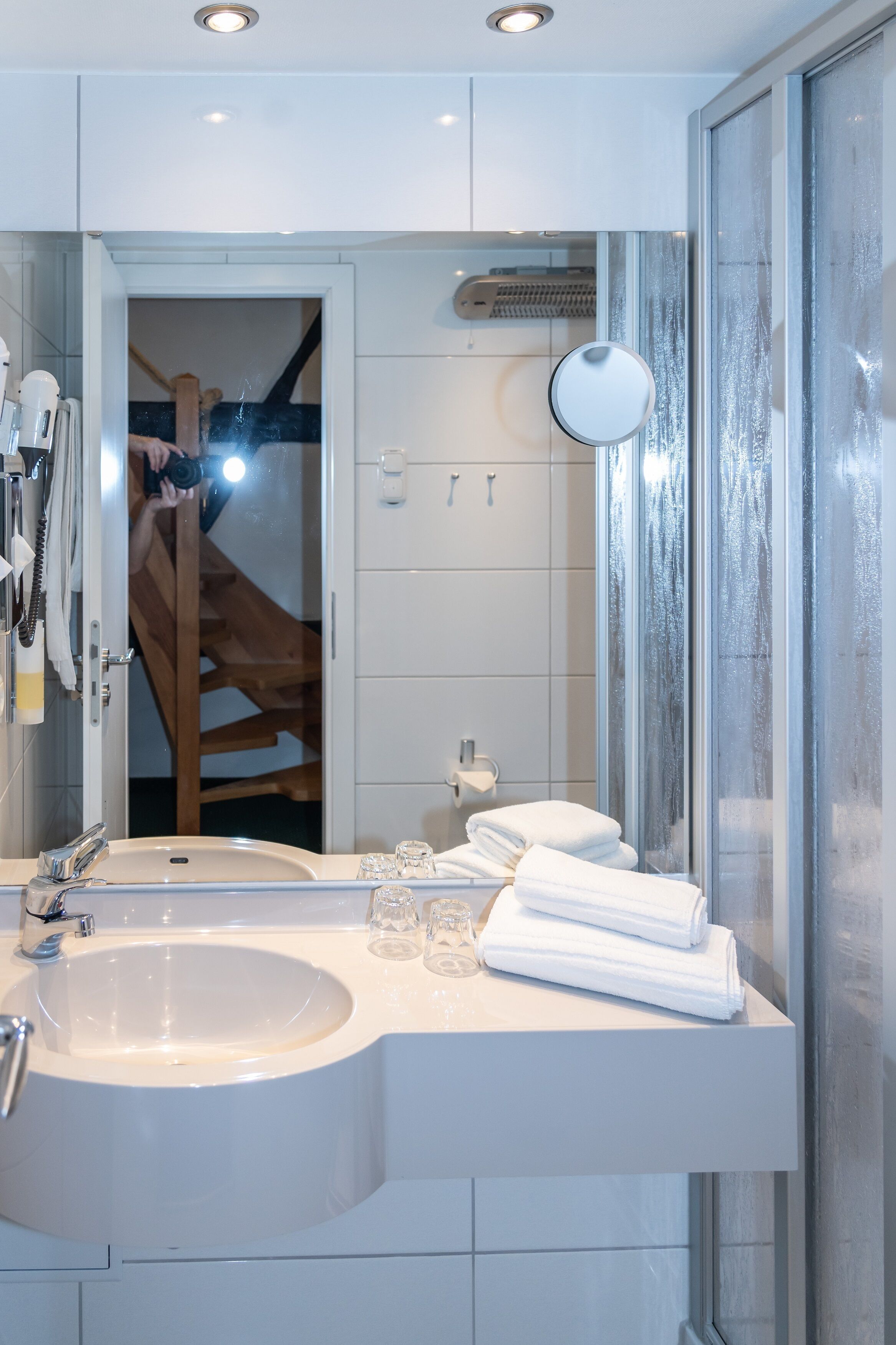 deluxe suite | bathroom | shower, free toiletries, hair dryer, towels