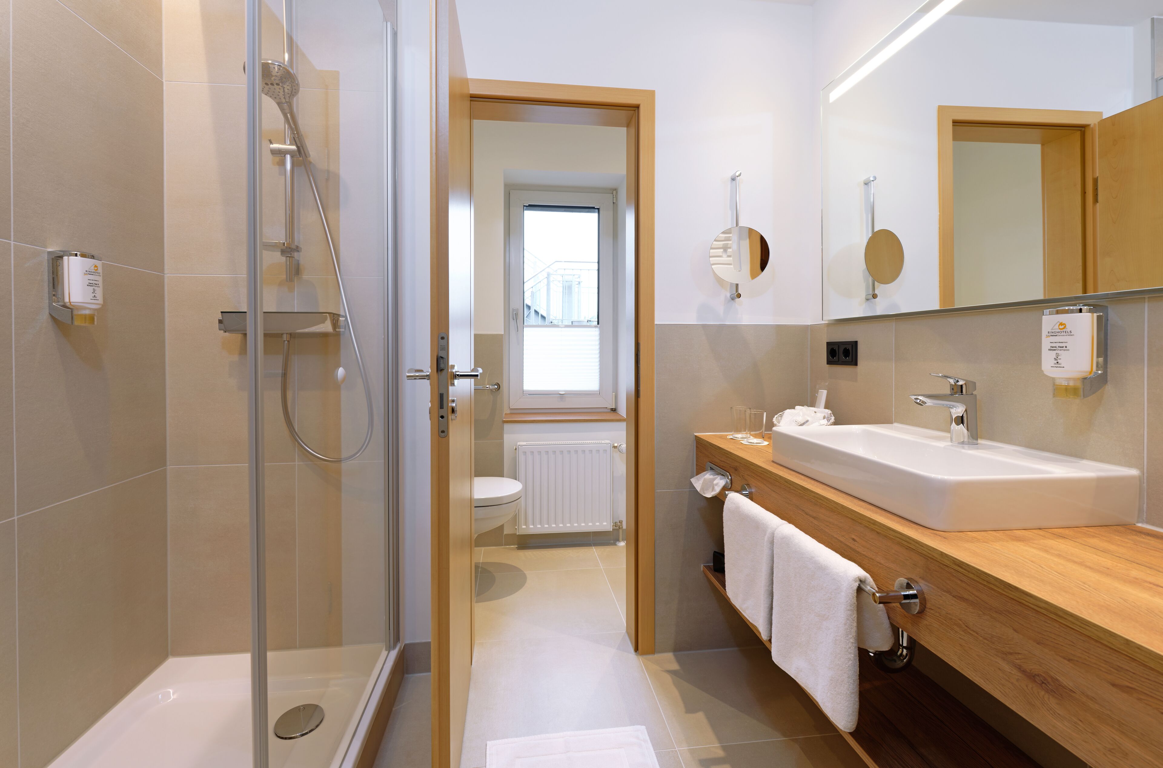 double room (landhaus king beds/ two matresses) | bathroom | free toiletries, hair dryer, bathrobes, towels