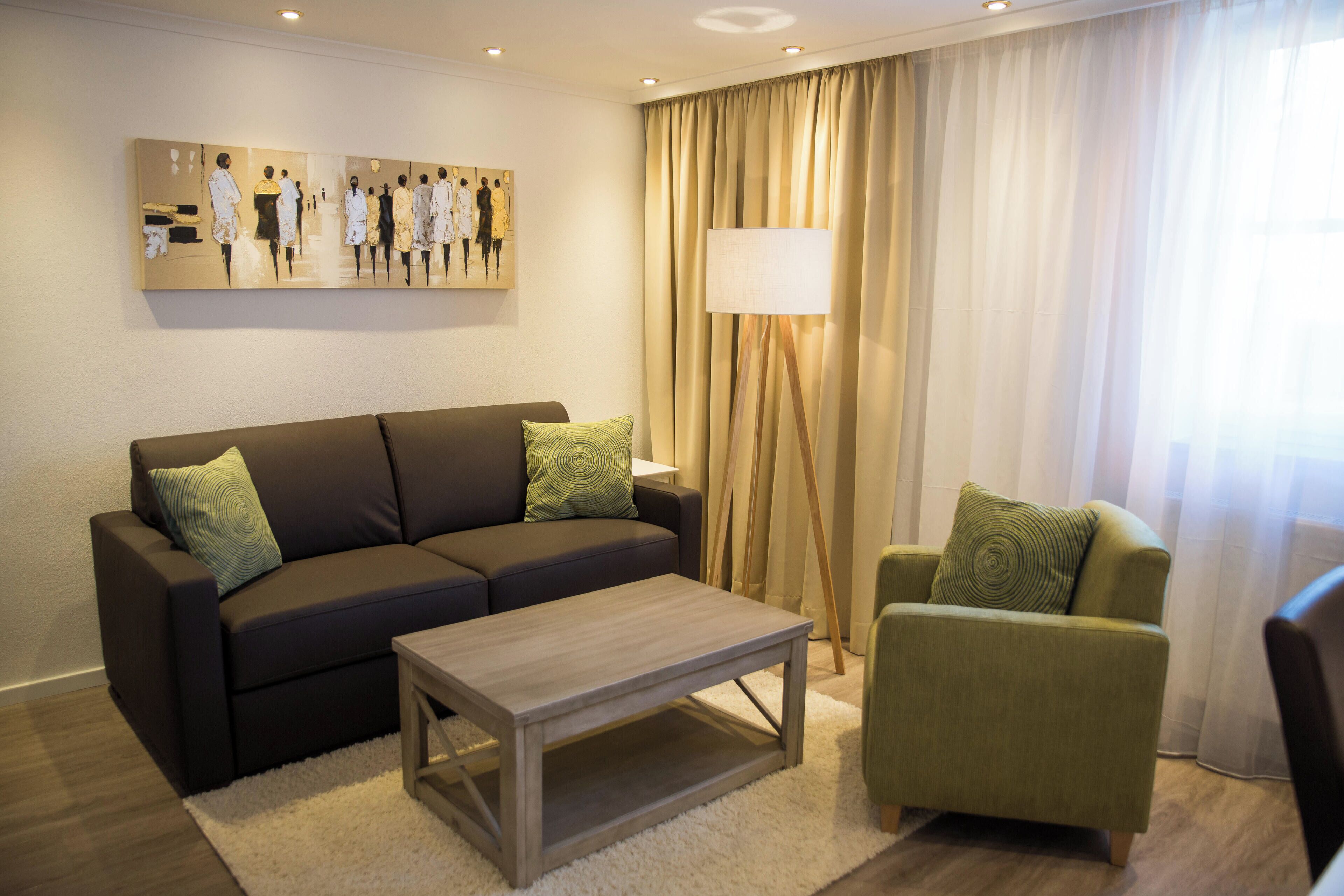 junior suite | living area | 32-inch flat-screen tv with satellite channels, tv