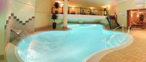 Indoor pool, seasonal outdoor pool, open 7 AM to 9 PM, pool umbrellas
