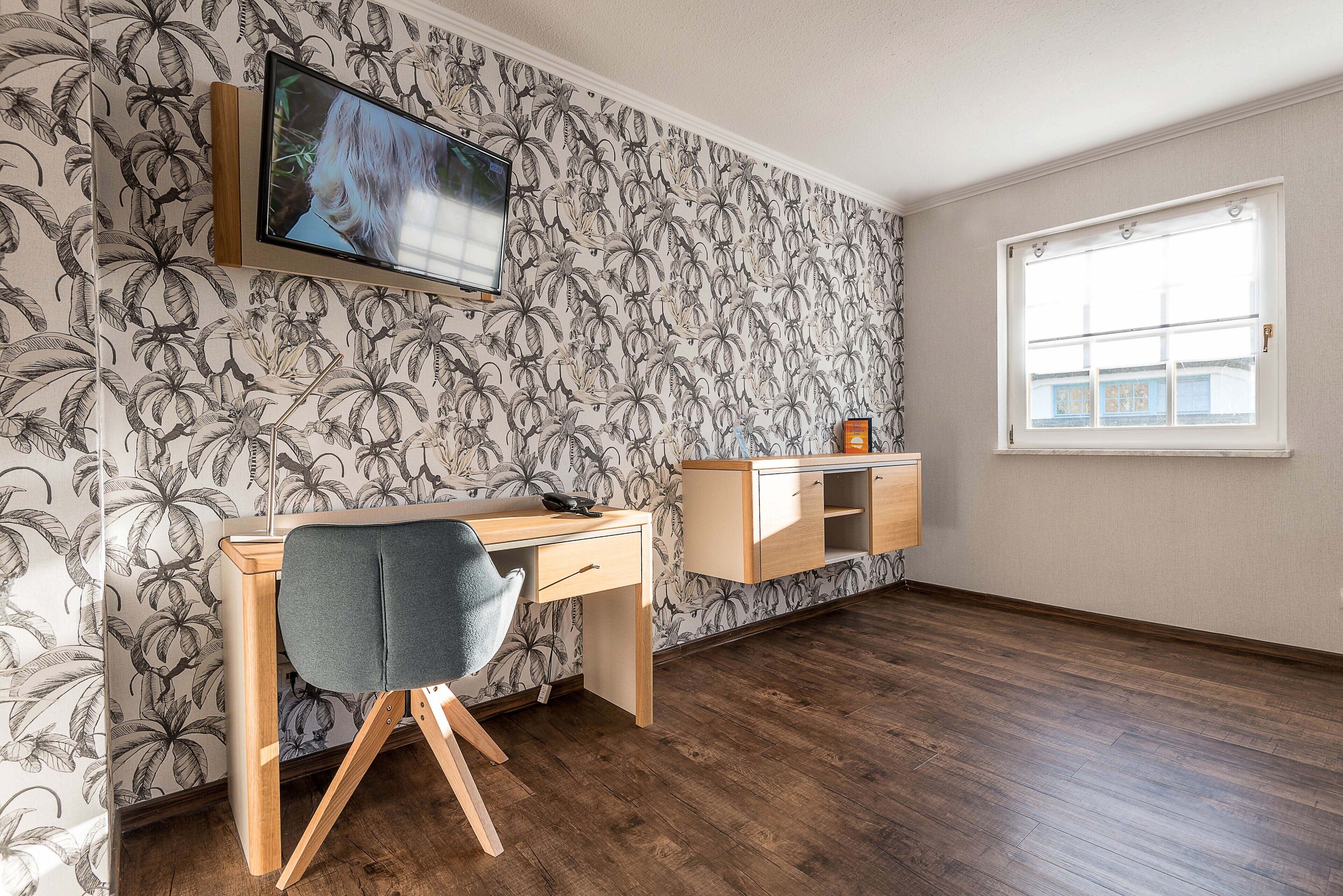 comfort double room | living area | tv, heated floors