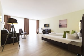 Family Double Room, 1 King Bed with Sofa bed, Non Smoking | Minibar, desk, laptop workspace, blackout curtains - Hotel am See (Grevesmuehlen)