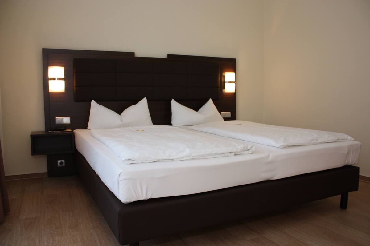 Minibar, desk, laptop workspace, blackout curtains