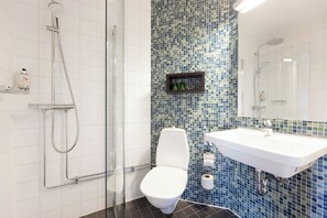 Shower, rainfall showerhead, eco-friendly toiletries, towels