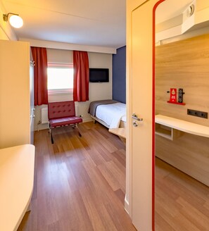 Desk, blackout curtains, free WiFi, bed sheets