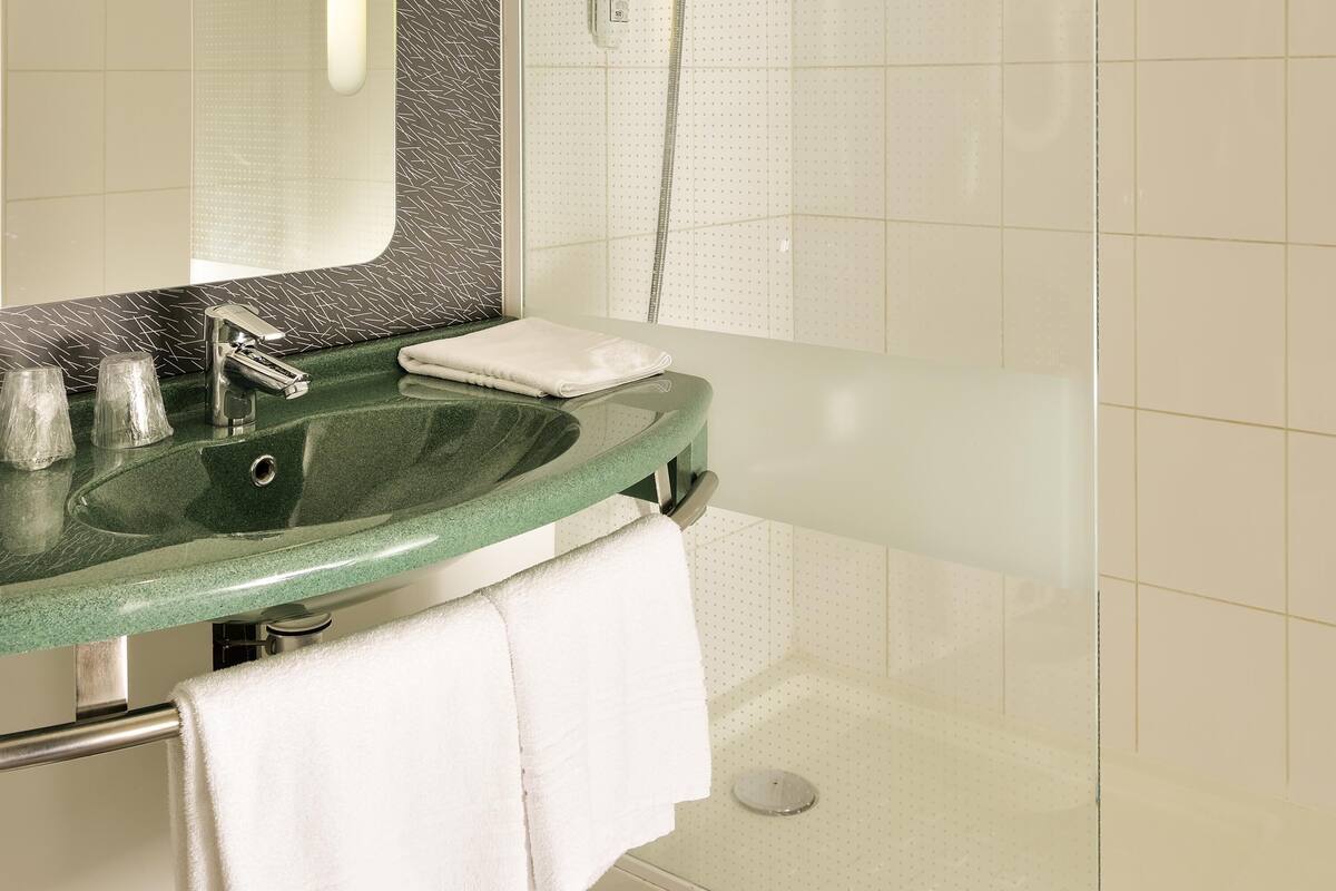 premium bedding, desk, blackout curtains, soundproofing